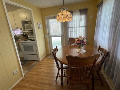 This 1971 home is offered turnkey and includes the golf cart! - photo 8