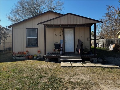 This 3-bedroom, 1-bath home sits on a large lot and offers - photo 1