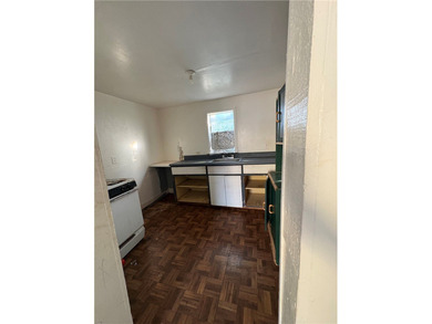 This 3-bedroom, 1-bath home sits on a large lot and offers - photo 9