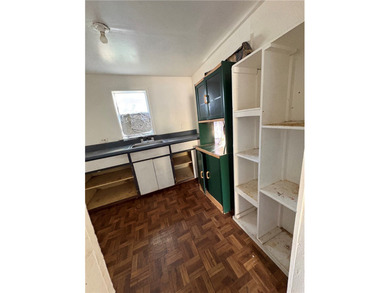 This 3-bedroom, 1-bath home sits on a large lot and offers - photo 10