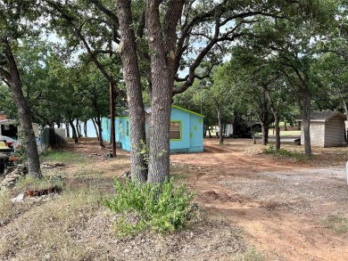 Waterfront opportunity with this 3 bdrm split 2 full bath MH on - Lake Home For Sale in Nocona, Texas