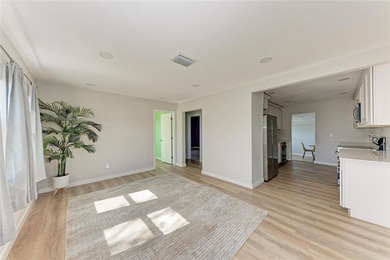 Short Sale. Welcome to this beautifully updated 4-bedroom - photo 2