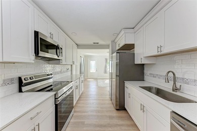 Short Sale. Welcome to this beautifully updated 4-bedroom - photo 9