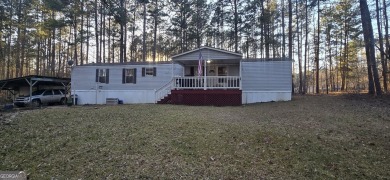 Lake Home For Sale in Eatonton, Georgia