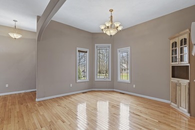 This beautiful all brick home featuring a 3 car garage and