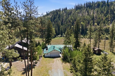 Stunning Clark Fork River frontage with direct access to the - photo 3
