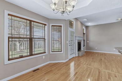 This beautiful all brick home featuring a 3 car garage and