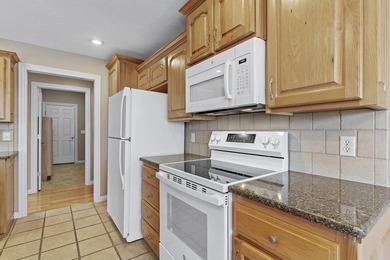 This beautiful all brick home featuring a 3 car garage and