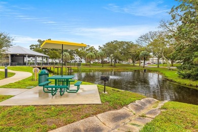 Wake up to peaceful views of a sparkling fountain pond from this - photo 25