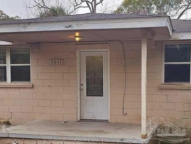 Investment opportunity with solid home, needs some TLC, but has - photo 1