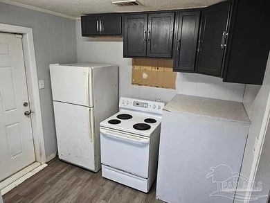 Investment opportunity with solid home, needs some TLC, but has - photo 7