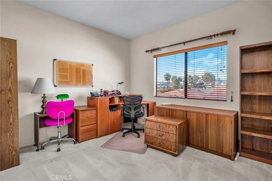 Welcome to this well-maintained top-floor unit located in the