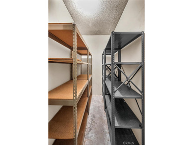Welcome to this well-maintained top-floor unit located in the