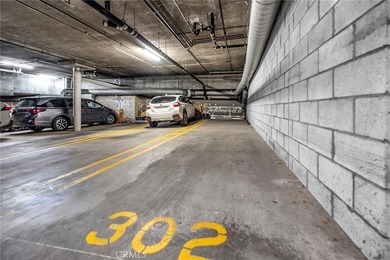 Welcome to this well-maintained top-floor unit located in the