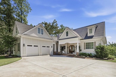 Welcome to 112 S. Cay Drive, a refined lakefront retreat on - photo 1