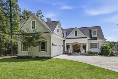 Welcome to 112 S. Cay Drive, a refined lakefront retreat on - photo 2