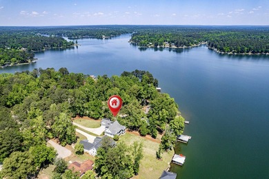Welcome to 112 S. Cay Drive, a refined lakefront retreat on - photo 3
