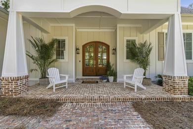 Welcome to 112 S. Cay Drive, a refined lakefront retreat on - photo 5