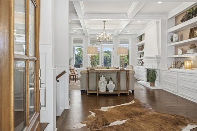 Welcome to 112 S. Cay Drive, a refined lakefront retreat on - photo 6