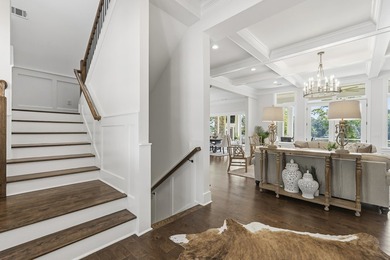 Welcome to 112 S. Cay Drive, a refined lakefront retreat on - photo 7