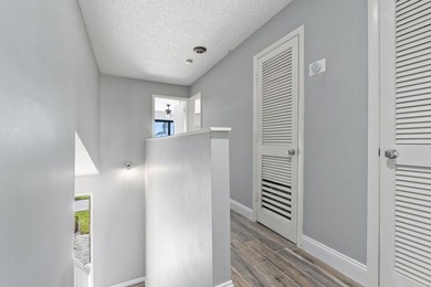 Set within Martin Downs Country Club, this 1,654 sq ft 3-bedroom - photo 24