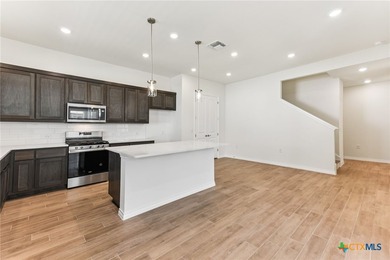 Evia plan with upgraded SHORE flooring package, quartz - photo 10