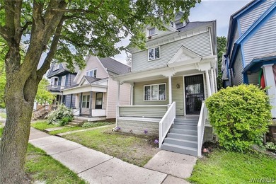 Welcome to this spacious and fully updated 2-family home - photo 2