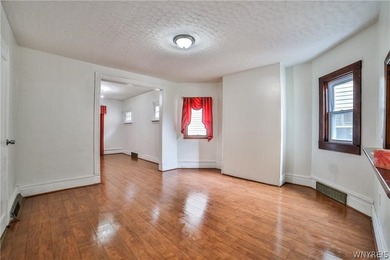 Welcome to this spacious and fully updated 2-family home - photo 8