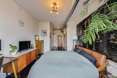 Rarely available West Loop Penthouse at The Metro with