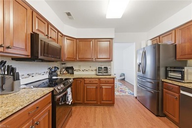 Nestled on a quiet cul-de-sac, this spacious 4-bedroom, 2.5-bath - photo 11