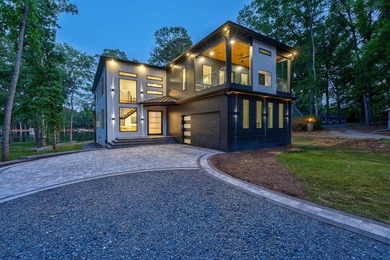Stunning Modern Lakefront New Construction | 150 Ft of Lake - photo 2