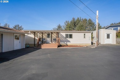 This residence offers expansive views of the Umpqua River - photo 2