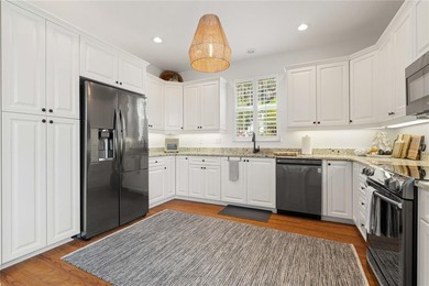 MOVE-IN READY, 1ST FLOOR TARPON COVE CONDO W/2-CAR GARAGE & POND - photo 34