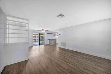Welcome to 9040 Lunar Lane, Port Richey. A 3-bedroom, 3-bathroom - photo 6