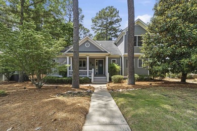 Located in Reynolds Landing, this lakeview home offers access to - photo 1
