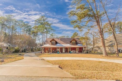 This stunning Satterwhite log home offers 2,550 square feet of - photo 2
