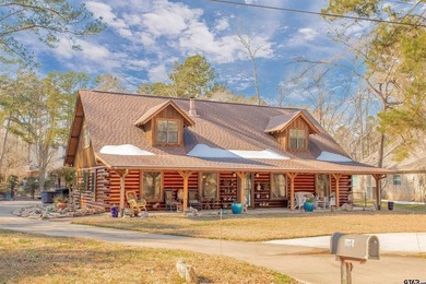 This stunning Satterwhite log home offers 2,550 square feet of - photo 3