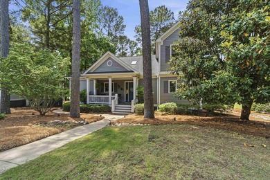 Located in Reynolds Landing, this lakeview home offers access to - photo 4