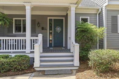 Located in Reynolds Landing, this lakeview home offers access to - photo 5
