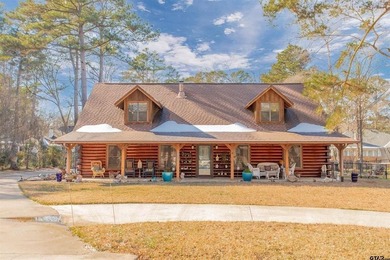 This stunning Satterwhite log home offers 2,550 square feet of - photo 5
