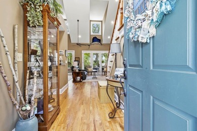 Located in Reynolds Landing, this lakeview home offers access to - photo 6