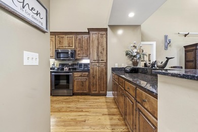 Located in Reynolds Landing, this lakeview home offers access to - photo 8