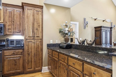 Located in Reynolds Landing, this lakeview home offers access to - photo 9