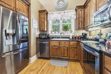 Located in Reynolds Landing, this lakeview home offers access to - photo 10