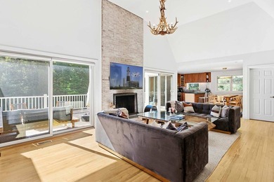 Tucked behind a dramatic gated entry in one of East Hampton's - photo 6