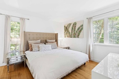 Tucked behind a dramatic gated entry in one of East Hampton's - photo 10
