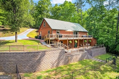 Fully furnished true log home on 5.78 private wooded acres in - photo 1
