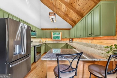 Fully furnished true log home on 5.78 private wooded acres in - photo 7