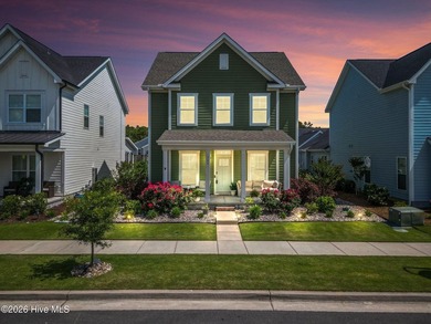 Some homes check boxes. This one sets standards. Nestled in the - photo 1