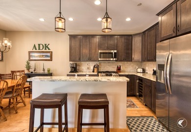 Discover the epitome of Adirondack luxury at The Lodges, the - photo 24